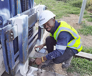 Zangula Welding and Quality Consultancy CContact us Lady with head phones and a microphone taking calls